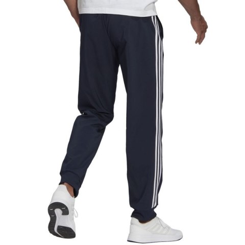 Spodnie adidas Essentials Tapered Cuff 3 Stripes Pants M GK8981 Spodnie adidas Essentials Tapered Cuff 3 Stripes Pants M GK8981