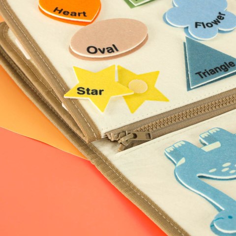 Tablica manipulacyjna sensoryczna montessori walizka dinozaury Tablica manipulacyjna sensoryczna montessori walizka dinozaury