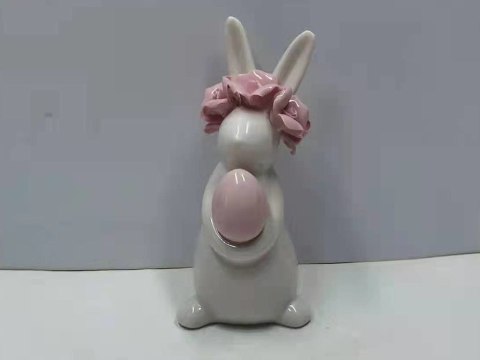 Figurka ceramiczna zajączek z jajkiem i wiankiem 12,5cm Figurka ceramiczna zajączek z jajkiem i wiankiem 12,5cm